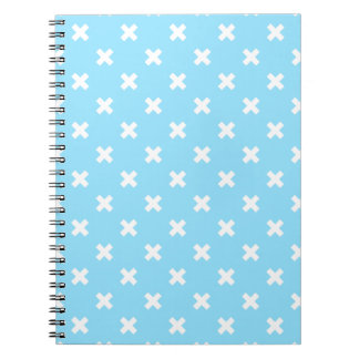 Carnet Croix blanche sur le bleu bébé