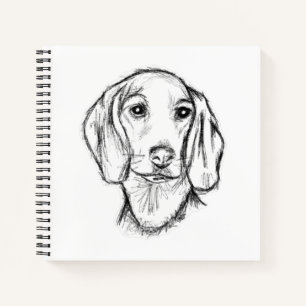 Carnet croquis de teckel dessiné à la main en noir et bla