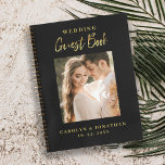 Carnet Elegant Mariage de script Gold Photo Guestbook<br><div class="desc">Un design minimaliste avec un très beau script de calligraphie or brossé contre un arrière - plan noir. Ajoutez votre meilleure photo et personnalisez vos informations de choix sur le devant avec vos initiales monographiques sur le dos. Un incontournable pour ce mariage spécial ou anniversaire.</div>