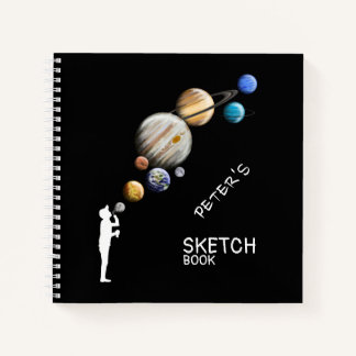 Carnet Garçon Silhouette soufflant Bubble Planètes Monogr