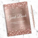 Carnet Glittery Rose Gold Foil 70th Birthday Guestbook<br><div class="desc">Créez votre propre livre d'or pour sa fête du 70e anniversaire dans ce carnet vierge. Parties scintillant brillante et rose de couleur or sur le bord supérieur et le bord inférieur sur un arrière - plan art numérique rose or et rose vif faux feuille métallique. Vous pouvez customiser la couleur,...</div>