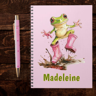 Carnet Grenouille en bottes roses mignonnes dans une flaq