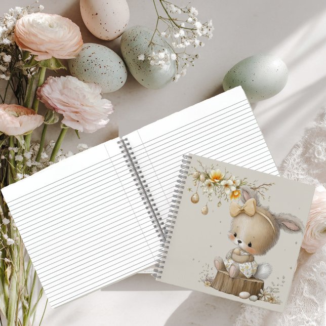 Carnet lapin mignon avec des œufs de Pâques dans une prai (Créateur téléchargé)