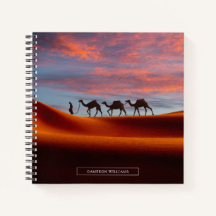 Carnet Les déserts Homme et chameaux dans les dunes de
