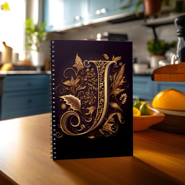CARNET LETTRE MONÂTRE J (Notebook with monogram letter J stands on kitchen table)