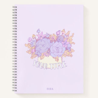 Carnet mignon violet avec fleurs dessinées à la ma