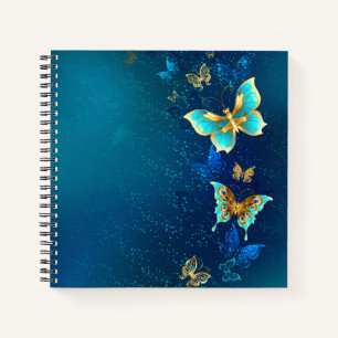Carnet Papillons d'or sur un Arrière - plan bleu