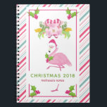 Carnet Pink Flamingo Tropical Christmas<br><div class="desc">A whimsical tropical christmas notebook. A fancy pink flamingo with a leg raised up. Wearing a pink santa hat and some seasonal holly. Holly with berries also decorate the corners. A floral bouquet with candy canes above her head. A pink and green candy cane striped background. Personalize with your name...</div>
