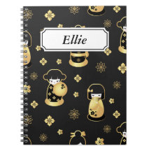 Poupées japonaises d'or noires élégantes