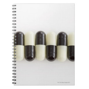 Carnet Rangée des pilules noires et blanches