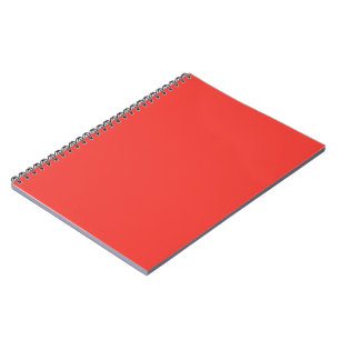 Carnet un arrière - plan rouge avec une bordure blanche