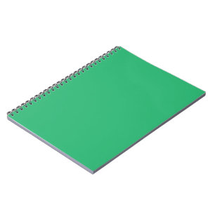 Carnet un arrière - plan vert avec une bordure blanche