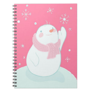 Carnet Un bonhomme de neige atteignant pour un flocon de