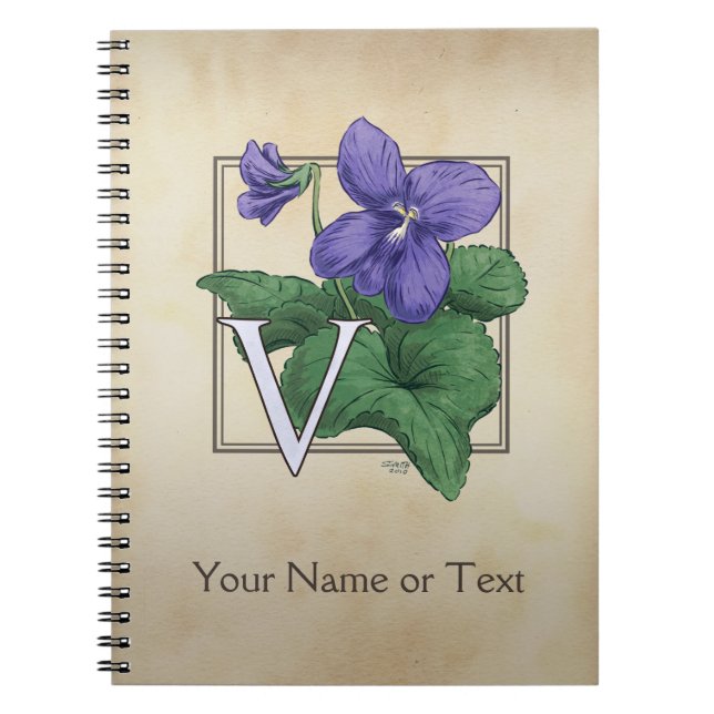 Carnet V pour le monogramme violet d'alphabet de fleur (Devant)