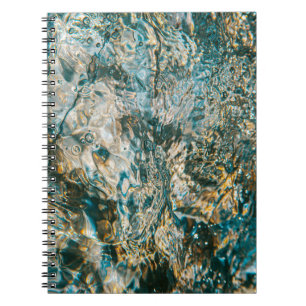 Carnet Water splash in close up photography