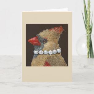Carol le cardinal avec une carte de voeux perles