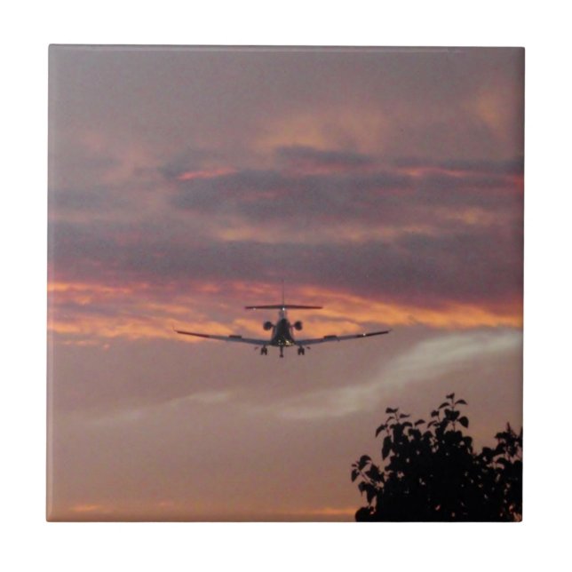 Carreau Atterrissage d'un jet commercial au coucher du sol (Devant)