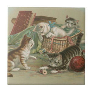 Carreau Chatons victoriens vintage jouant dans un panier à