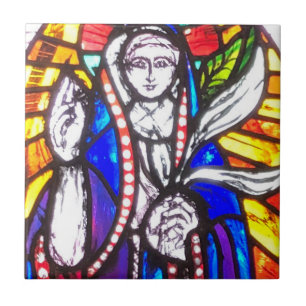 Carreau Conception de vitrail avec figure religieuse.