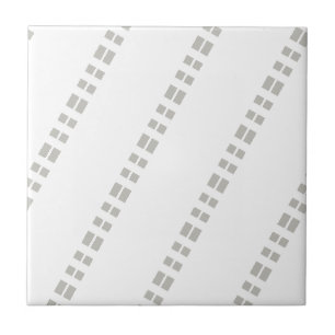 Carreau de céramique gris et blanc rayé