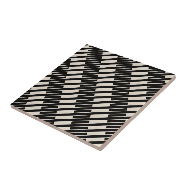 Carreau de céramique rayé noir et beige (Côté)