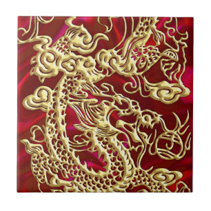 Carreau Dragon d'or embouti sur papier satin rouge