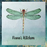 Carreau Dragonfly vintage Green Gold sur les aquarelles bl<br><div class="desc">Cette conception comporte une illustration de libellule vintage en vert, rouille et or contre un arrière - plan bleu-vert doux en aquarelle. Le motif vert et noir sur les ailes de la libellule est lumineux et distinctif. Votre nom ou tout autre message que vous voulez, comme "Nana's Kitchen" ou "Be...</div>