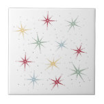 Carreau Drôle Starbursts Atomique milieu du siècle 1950<br><div class="desc">Finissez votre projet de carrelage avec ce fabuleux carrelage en céramique du milieu du siècle de l'ère atomique. Ce design présente des éclats de starbursts en rouge,  bleu,  vert et jaune et accentué de points noirs.</div>