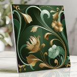 Carreau Élégant Art Nouveau Floral Emerald and Gold<br><div class="desc">Ajoutez à votre espace un raffinement intemporel grâce à cet élégant carrelage d'inspiration Art Nouveau. Avec des tons émeraude et or profonds, ce design présente des motifs floraux et viticoles organiques fluides, des accents métalliques complexes et des courbes botaniques stylisées. Parfait pour créer de luxueux répliques, des murs accentués ou...</div>