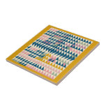 Carreau Formes géométriques peintes de lumières colorées e<br><div class="desc">Apportez une touche de charme géométrique à votre espace grâce à ce carrelage en céramique coloré qui présente un motif triangle ludique dans les tons pastel, encadré par une bordure jaune moutarde. Parfait comme un accent décoratif pour un fond de cuisine, salle de bain, ou comme un dessous de verre...</div>
