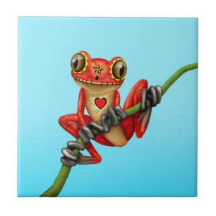 Carreau Jour rouge de la grenouille d'arbre morte de crân