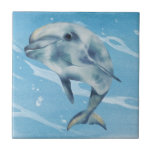 Carreau Joyeux Dolphin Watercolor Beach Océan<br><div class="desc">Cette conception peut être personnalisée en choisissant l'option Modifier la conception. Vous pouvez également transférer sur d'autres objets. Contactez-moi à l'adresse colorflowcreations@gmail.com ou utilisez l'option conversation en haut de la page si vous souhaitez avoir cette conception sur un autre produit ou avez besoin d'aide. Voir d'autres de mes dessins ou...</div>