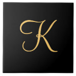 Carreau K initial de couleur or sur arrière - plan noir<br><div class="desc">K initial de couleur or sur arrière - plan noir</div>