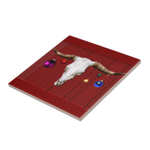 Carreau Le crâne de vache avec les ornements de Noël sur l