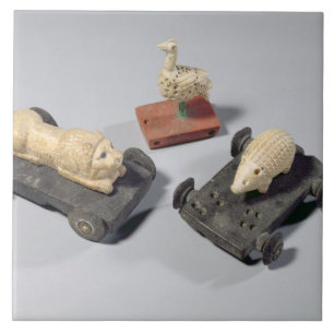 Carreau Les jouets des enfants : un hérisson, un lion et