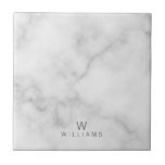 Carreau Marbre blanc avec monogramme et nom personnalisés<br><div class="desc">Ajoutez une touche de style unique à votre décor de maison avec ce Marbre blanc avec Monogramme personnalisé et Name Ceramic Tilefeaturing monogramme et nom en gris moderne sans serif style police sur arrière - plan en marbre blanc. Parfait comme cadeau de bienvenue, cadeau mariage, cadeau de vacances, cadeau de...</div>