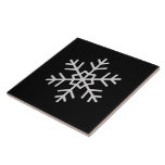 Carreau Modern Snowflake Accent Solid Black Tile Art<br><div class="desc">A sleek and stylish ceramic tile featuring a modern snowflake accent on a deep black background. Perfect for home décor, holiday displays, or custom art projects, this tile brings a touch of winter elegance to any space. Durable, glossy, and versatile for creative uses.</div>