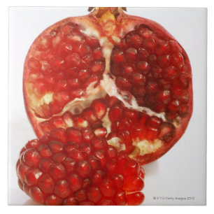 Carreau Moitié d'une coupe mûre de grenade pour exposer le