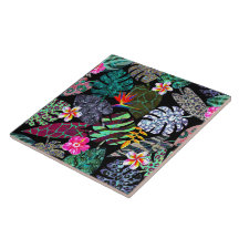 Motif de feuilles et de fleurs tropicales vibrante