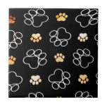 Carreau Motif Empreinte de patte noir blanc<br><div class="desc">Ce mignon petit empreinte de patte est parfait pour les amoureux des animaux de compagnie partout. Dispose d'un arrière - plan noir et d'empreintes de pattes blancs et or dans un motif éparpillé.</div>