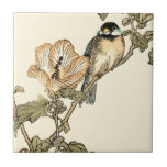 Carreau Oiseau oriental perché sur la branche<br><div class="desc">Cette impression d'art présente une image vif et pointue d'un oiseau oriental perché sur une branche. En dessous, il y a une fleur orange avec un haut degré de précision de couleur. Ce dessin d'art contemporain d'un art traditionnel d'inspiration orientale ajoutera du caractère à tout mur de votre maison.</div>