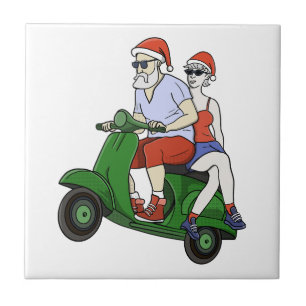 Carreau Père Noël et Mme Claus chevauchant un scooter