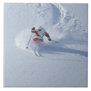 Carreau Père Noël faisant du ski à la station de ski Snowb