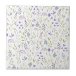 Carreau Purple Floral Ceramic Tile<br><div class="desc">Bring a breath of fresh air into your space with this soft purple floral design, featuring a delicate scatter of lavender, lilac, and soft blue blossoms intertwined with gentle green foliage. The airy, hand-painted look creates a calm, romantic feel reminiscent of a quiet spring meadow - perfect for brightening your...</div>