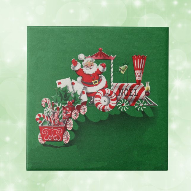 Carreau Santa Clause Candy Train (Santa riding red and white train with letters candy canes with peppermint wheels on green tile.)