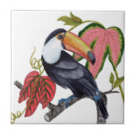 Carreau Toco Toucan<br><div class="desc">Toco Toucan I par Melissa Wang. Un toucan unique est perché sur une branche avec des feuilles tropicaux. | 164390Z</div>