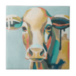 Carreau Vache colorée<br><div class="desc">Cette impression colorée présente un portrait en orange et turquoise | Par Grace Popp</div>