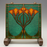 Carreau Verre en fleur enchâssé<br><div class="desc">Transformez votre espace de vie avec le Carrelage en céramique Enchanted Blossom, une pièce captivante imprimée par Zazzle. Ce carrelage en céramique plate, conçu sans relief, dégage le charme de l'Art Nouveau avec son effet de vitrail complexe. L'aménagement est élégant, avec des fleurs d'oranger, gracieusement entremêlées à un riche arrière...</div>