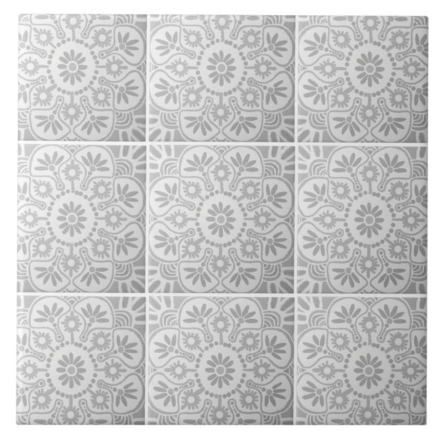 Carreaux de céramique géométrique gris et blanc (Nine gray and white geometric tiles shown together.)