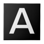 Carreaux de lettre<br><div class="desc">Carreaux en céramique.  Carreaux de lettres coques supérieurs ou inférieurs.  Vous customisez avec la ou les lettres dont vous avez besoin pour votre panneau en céramique ou en mosaïque.  Carrelage de lettre pour les panneaux d'épreuve météorologique,  numéros de maison.  Blanc sur arrière - plan noir.</div>